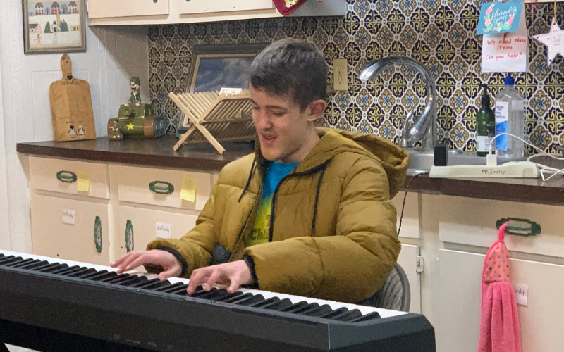 Rowan McJimsey at the keyboard at the Museum of the American Military Family in Tijeras, New Mexico.