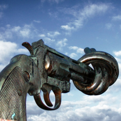 sculpture of a gun with the barrel tied into a knot