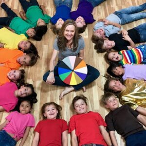 Susie Tallman and a lot of her students