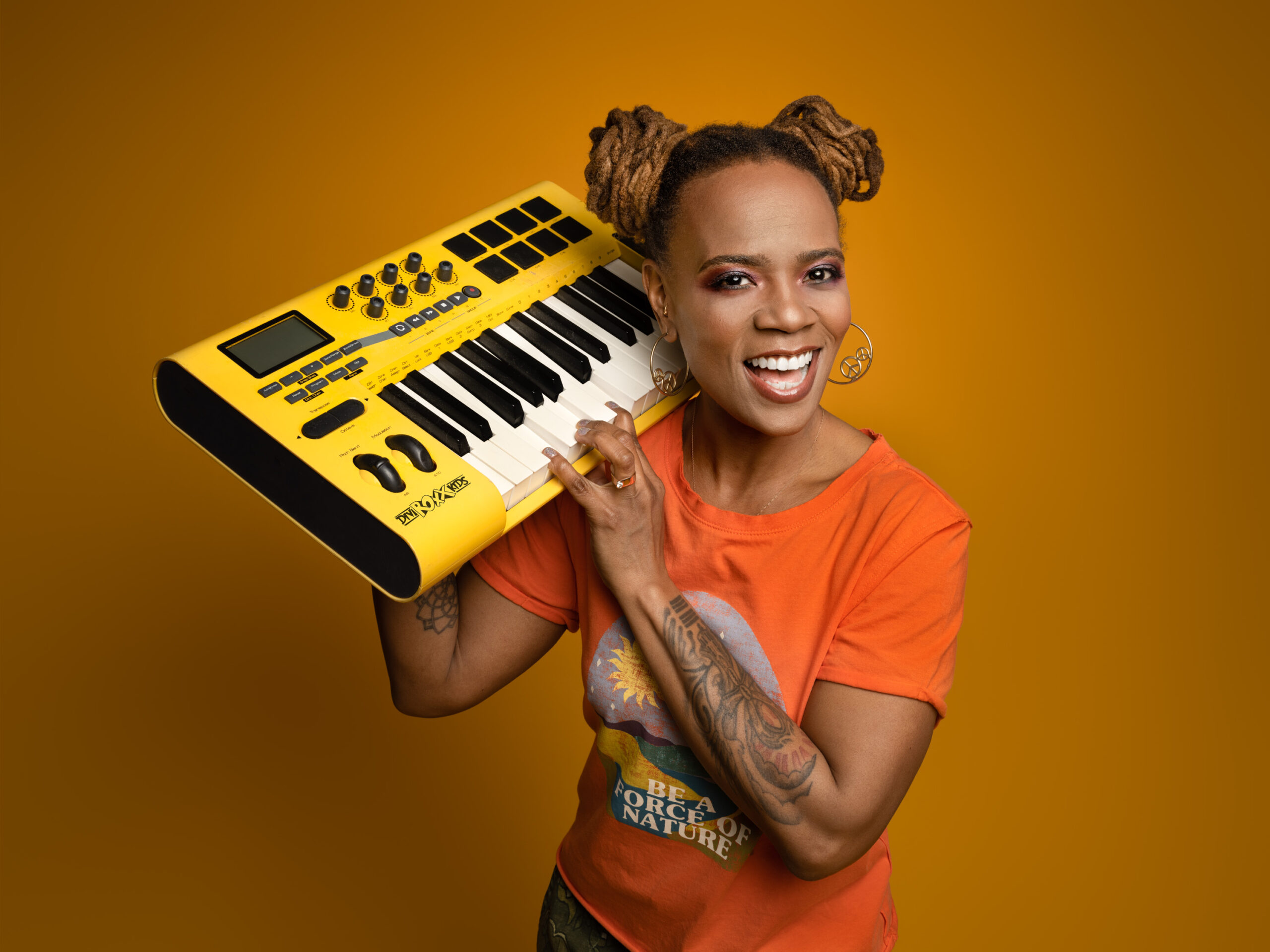 Divinity Roxx and her keyboard synthesizer